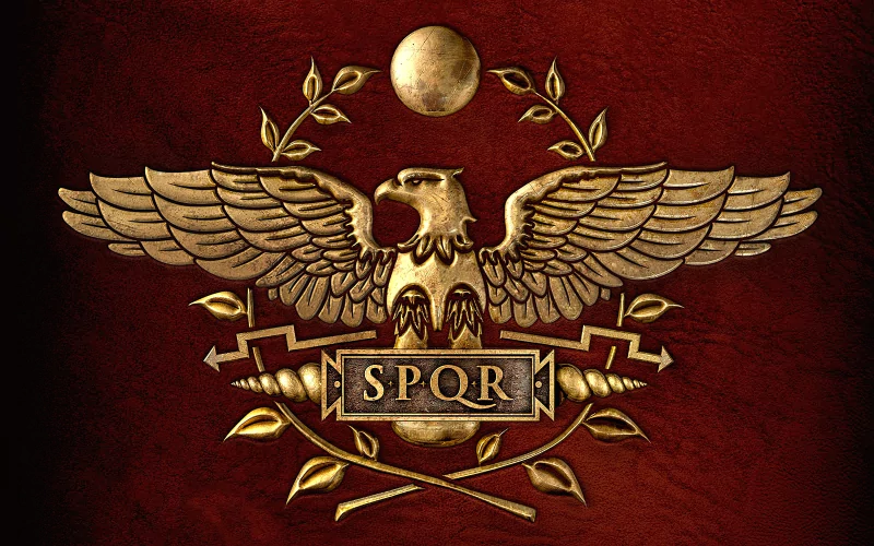 A striking emblem featuring an eagle and the text SPQR, symbolizing Roman authority, representing the Total War: Rome II video game.
