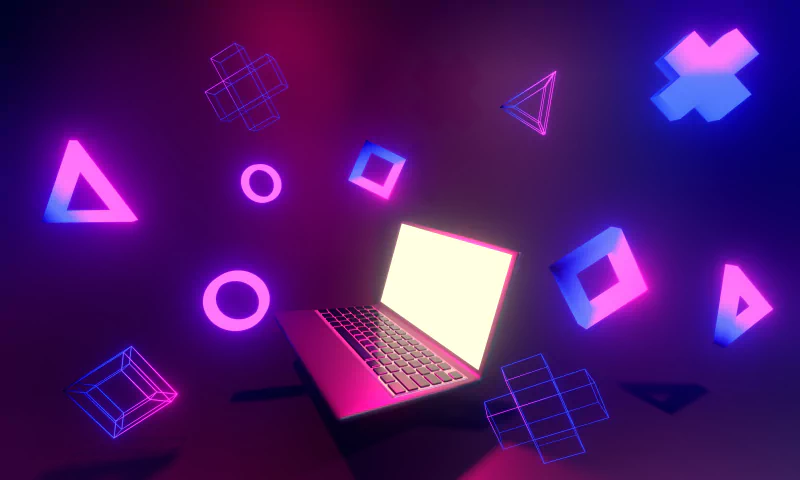  Ordinateur portable pour jeu vidéo en ligne sur fond de lumières led néon coloré, rendu 3d