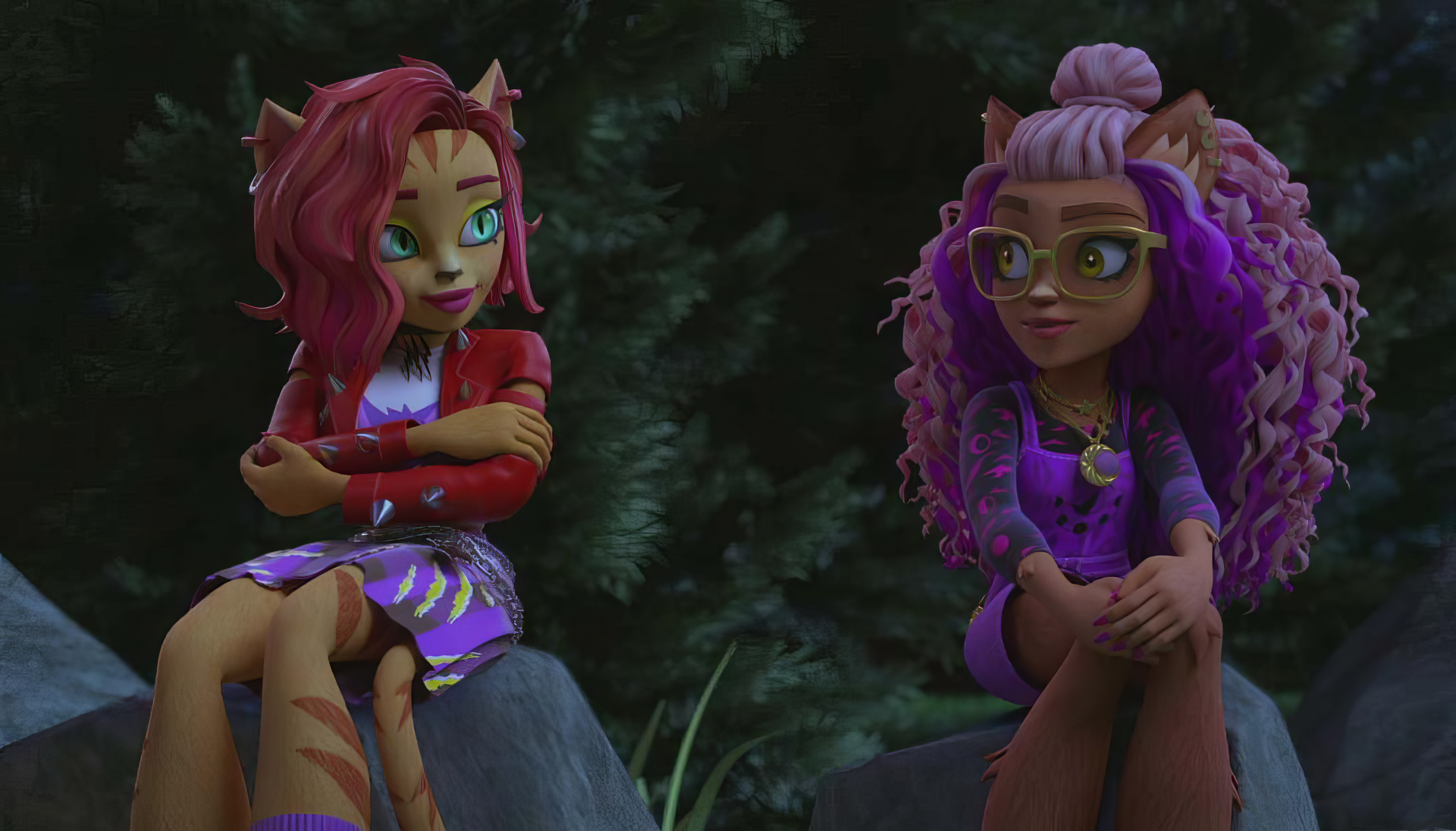 Two animated characters from the Monster High TV show sitting on a rock, one with striking red hair and horns, the other with curly purple hair and glasses, in a dark, wooded setting.