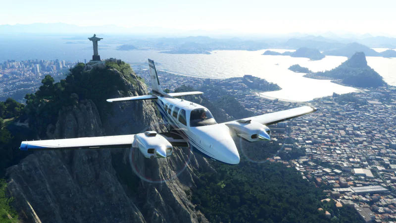 Small aircraft flying over Rio de Janeiro with the iconic Christ the Redeemer statue in the background in Microsoft Flight Simulator video game.