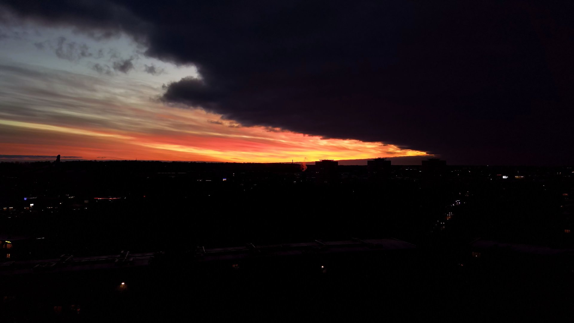 Clash between Sunset and Dark Clouds by jacvivo13