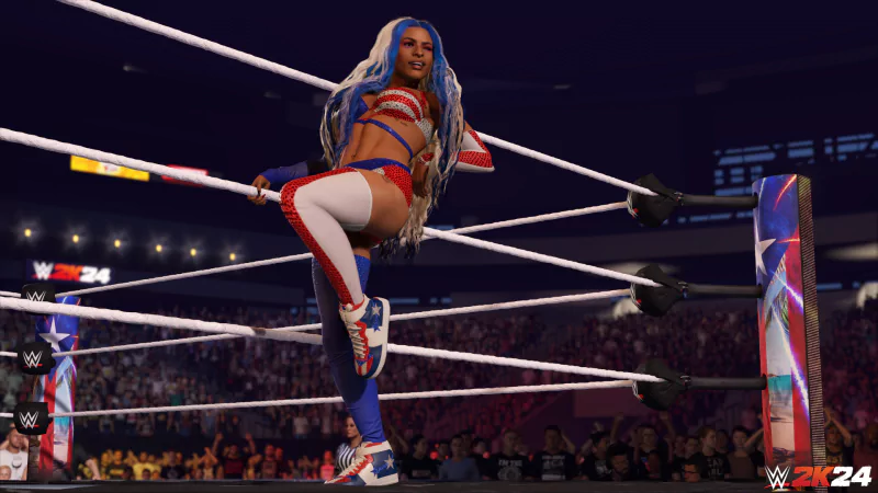 WWE 2K24 video game screenshot featuring a female wrestler performing in the ring during a match.