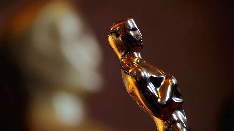 Close-up of an Oscar statuette at the Academy Awards event.