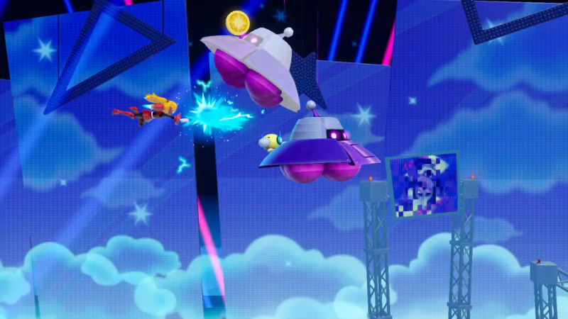 Colorful scene from the video game 'Princess Peach: Showtime!' featuring Princess Peach in her spaceship navigating through obstacles in a vibrant space-themed level.