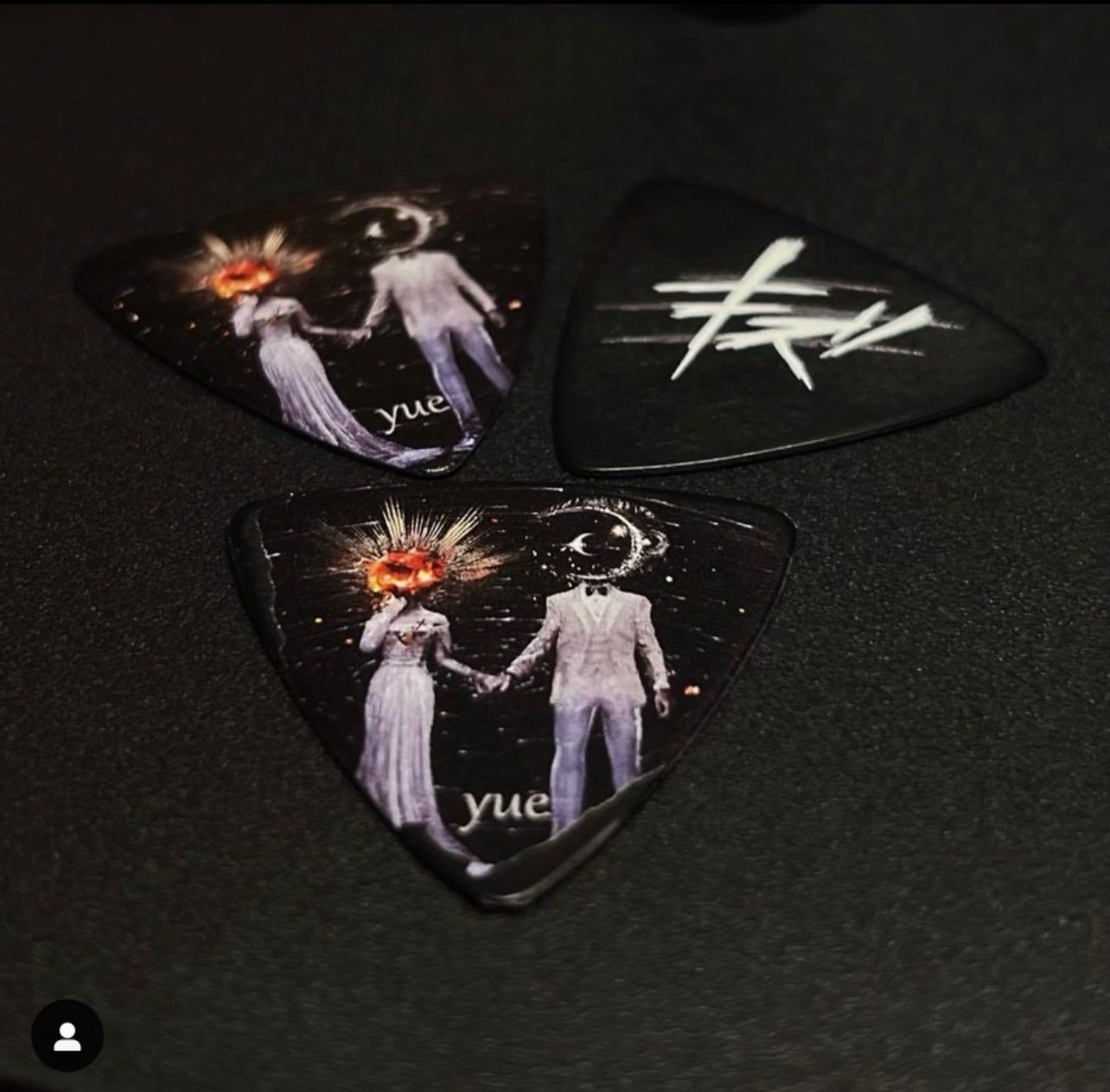 Kizu band members striking a pose in stylish Visual Kei attire, embodying the essence of JRock culture with a Japanese flair.