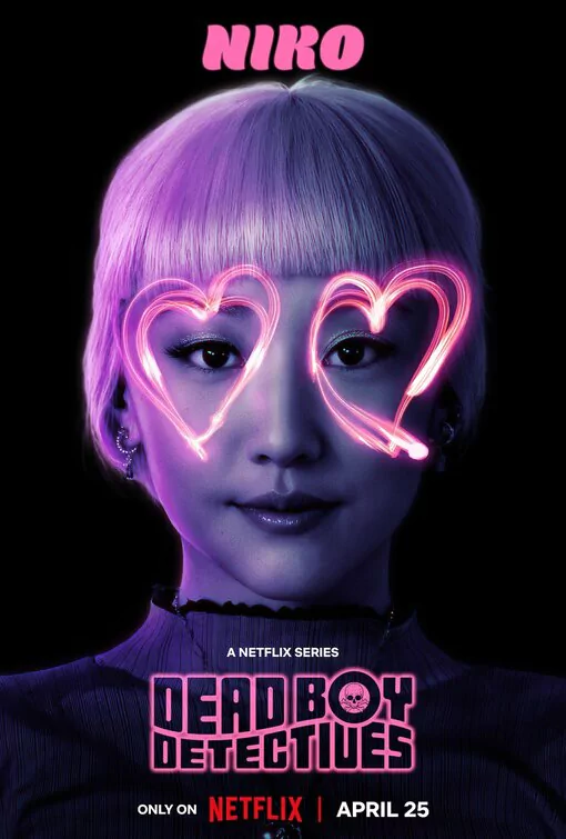 Promotional poster for Dead Boy Detectives featuring character Niko with neon pink heart-shaped glasses, premiering April 25 on Netflix.