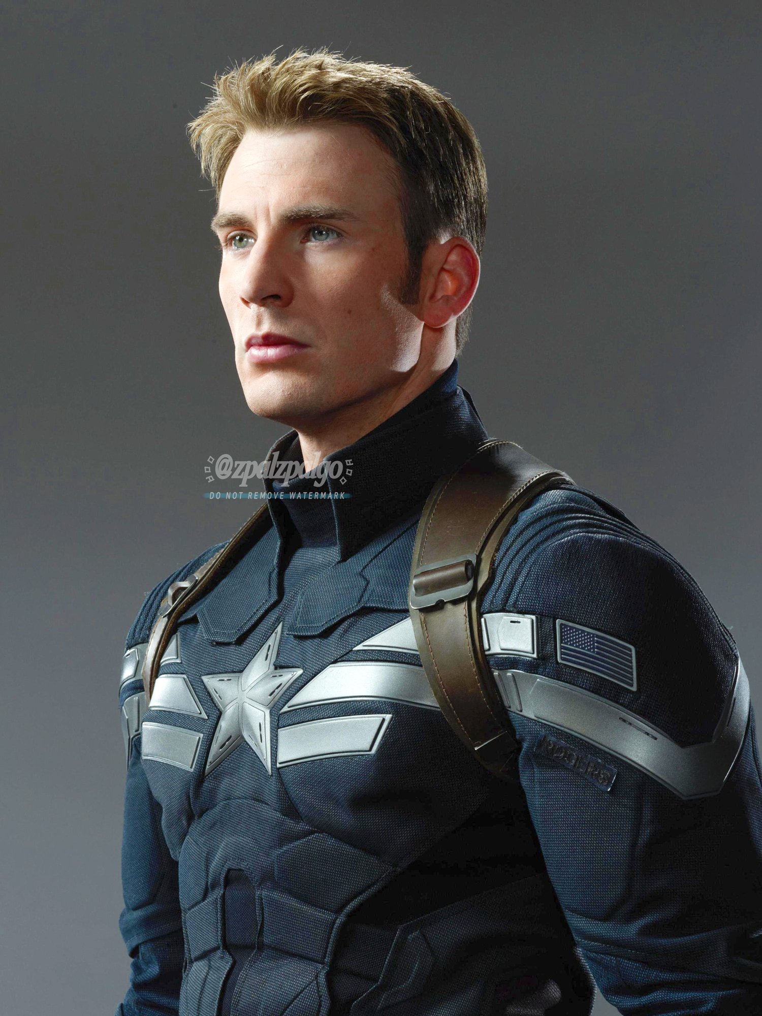 Steve Rogers wearing his Captain America suit in the movie The Winter Soldier, exuding strength and bravery.