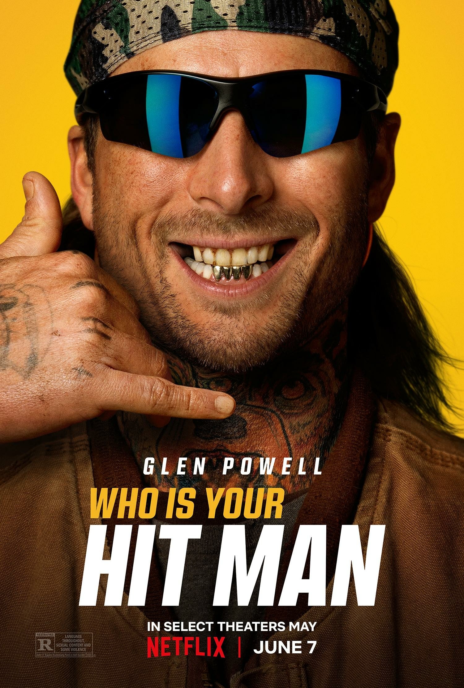 Movie poster for Hit Man (2023) featuring Glen Powell. Glen is wearing sunglasses and a bandana, smiling with a finger-gun gesture. Text reads WHO IS YOUR HIT MAN, with release details below.