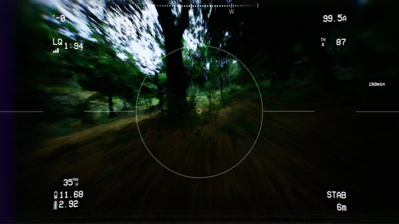 Bodycam view of a fast-paced video game, displaying a blurred forest with dynamic HUD elements, capturing the intensity of the gameplay.