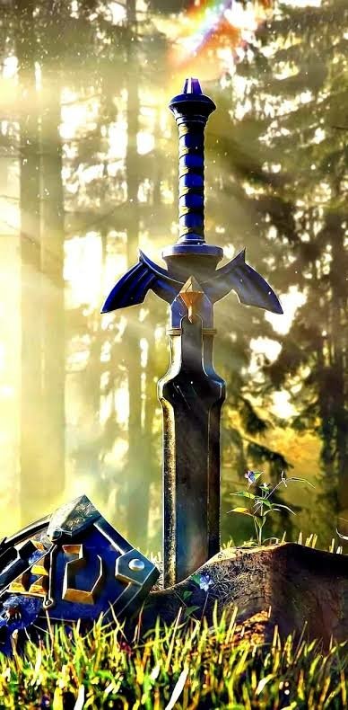 The Master Sword from The Legend of Zelda stands upright in a sunlit forest clearing, with a shattered shield resting nearby and a small flower blooming beside the blade.
