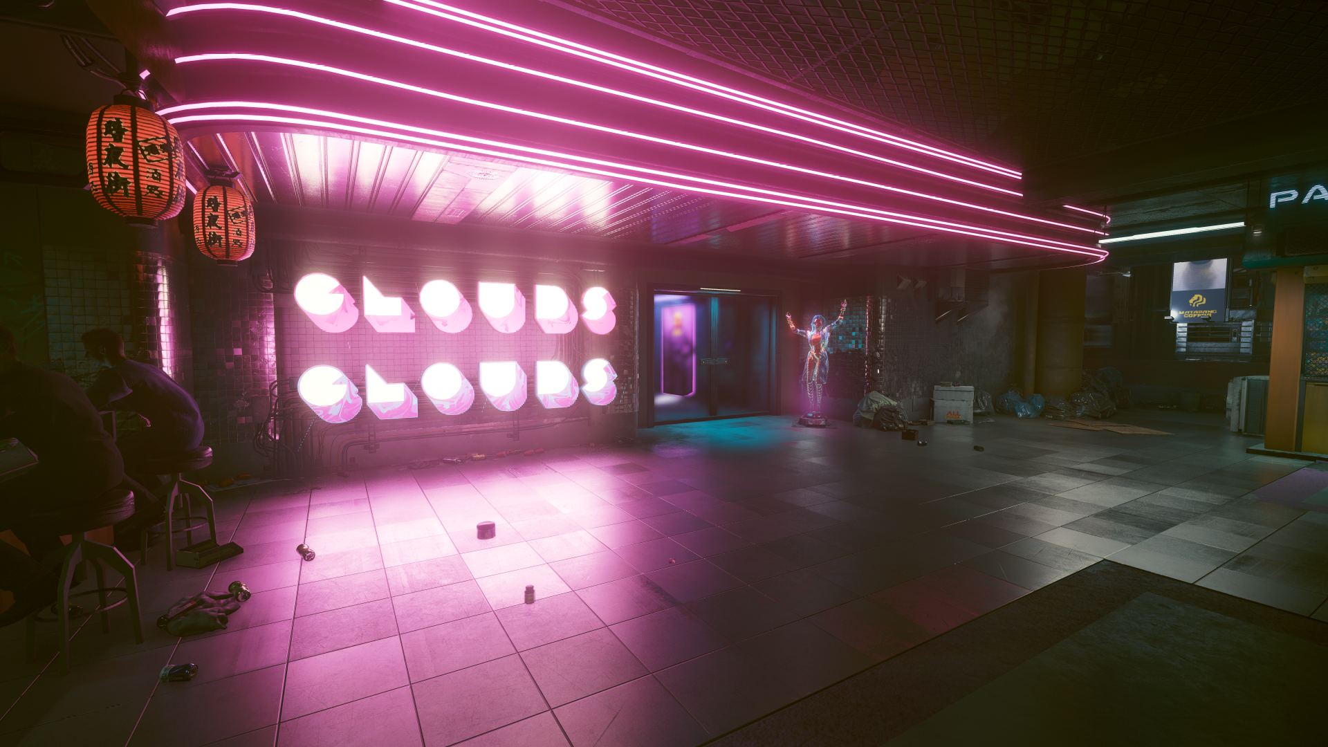 A neon-lit urban scene from the video game Cyberpunk 2077, featuring glowing pink signage and a futuristic, dimly lit street corner.