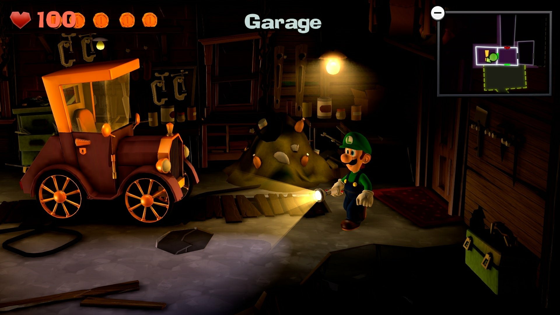 Screenshot from Luigi's Mansion 2 features Luigi in a garage, investigating an old car with a flashlight. The player's health and map are displayed on-screen.