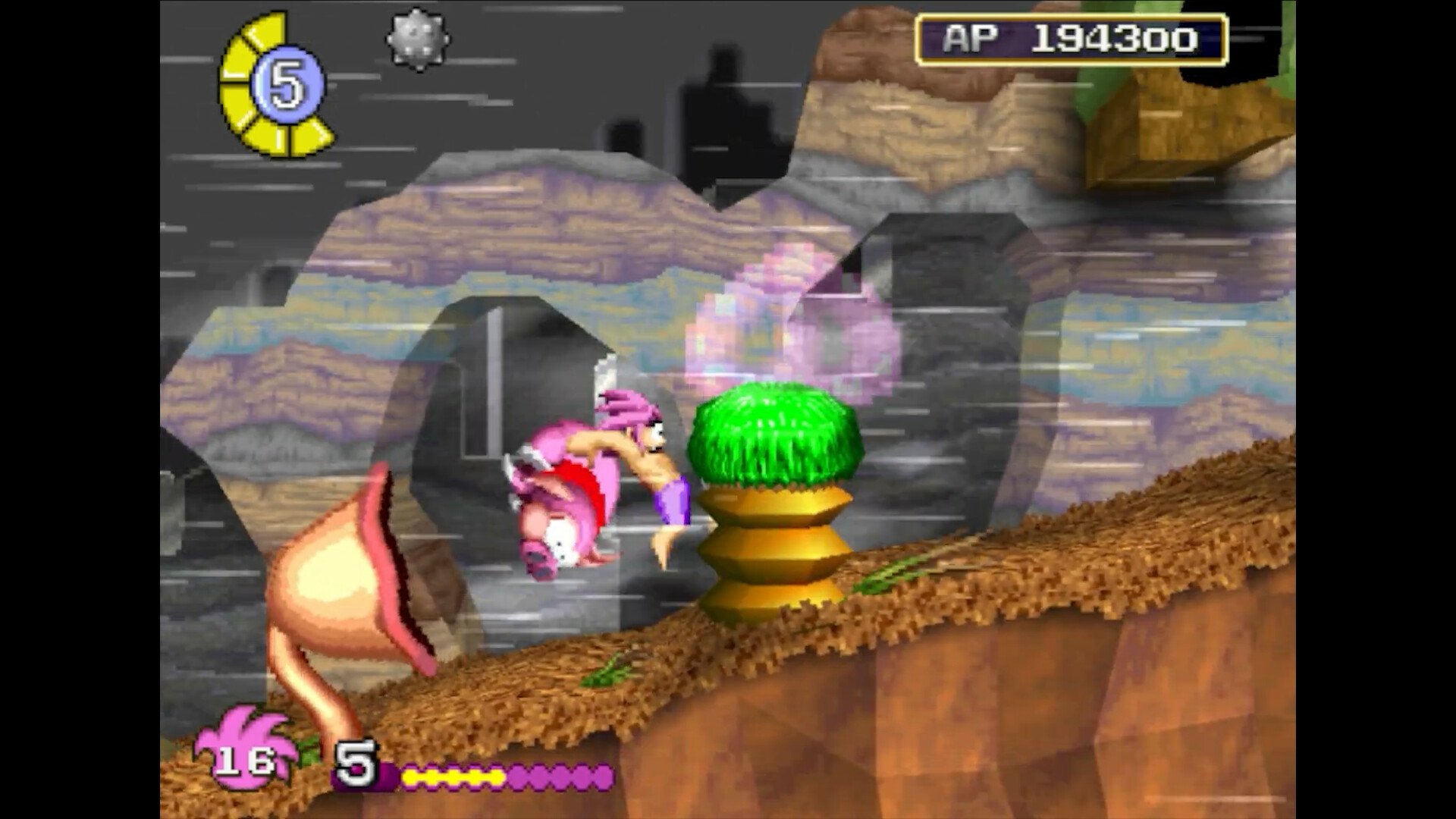Tomba! Special Edition features vibrant, whimsical graphics as the character Tomba navigates a colorful landscape, jumping past obstacles and interacting with unique elements.