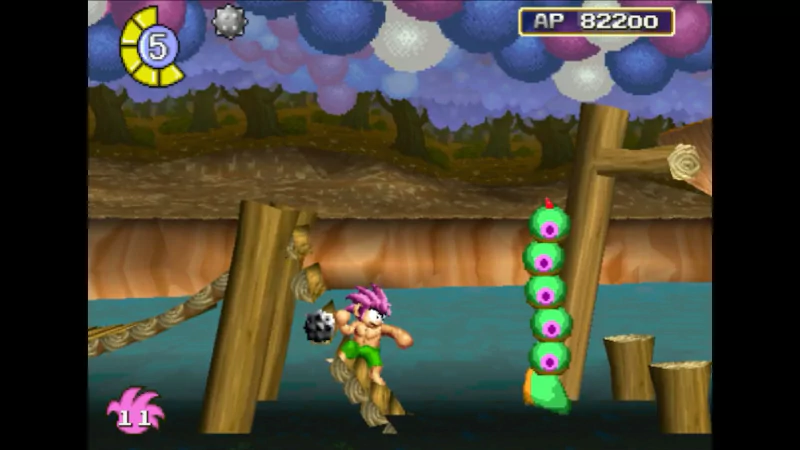 A colorful scene from the video game Tomba! Special Edition, featuring a character with pink hair navigating a waterway, surrounded by wooden structures and whimsical creatures.
