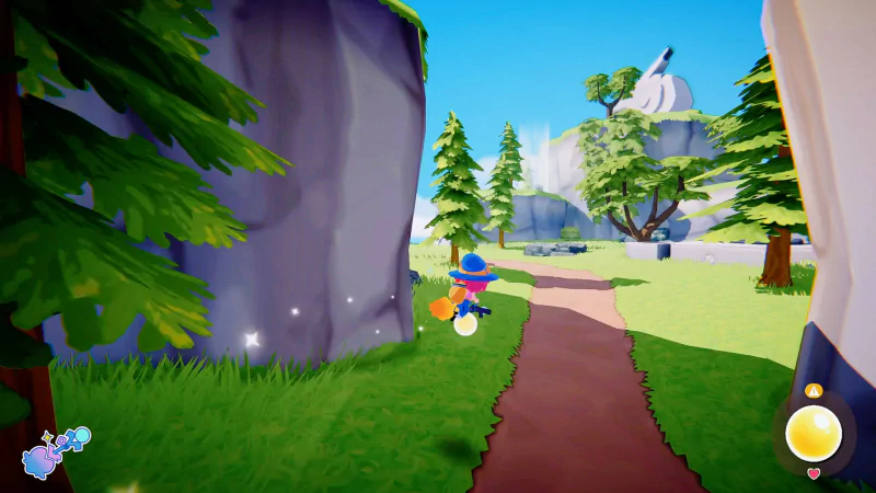 A colorful scene from the video game Mika and The Witch's Mountain, featuring a character in a blue hat walking along a winding path surrounded by trees and rocky cliffs.