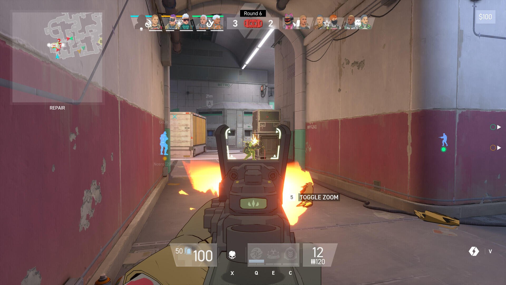A player aims a weapon in the video game Spectre Divide, with fire visibly erupting from the muzzle. The scene captures an intense moment in a corridor setting.