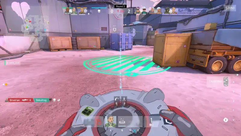 Gameplay scene from the video game Spectre Divide, featuring a player using a device on a pink-hued map, with various in-game elements and teammates visible in the background.