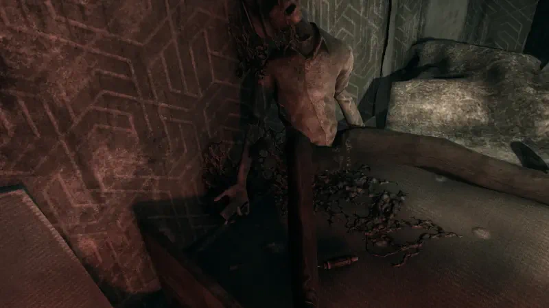 A haunting scene from the video game Hollowbody, featuring a distorted figure slumped against a textured wall, surrounded by debris in a dimly lit environment.