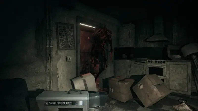 A shadowy figure emerges from a dim doorway in a cluttered kitchen, set within the eerie atmosphere of the video game Hollowbody, evoking tension and mystery.