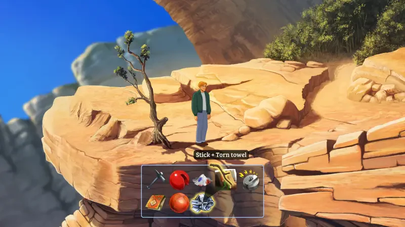 A character stands on a rocky ledge in Broken Sword - Shadow of the Templars: Reforged, with a collection of items displayed at the bottom of the screen.