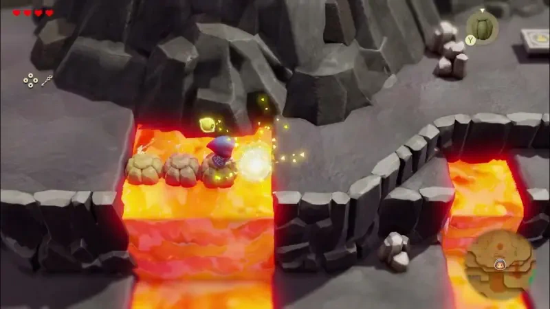 A character navigates a lava-filled terrain in The Legend of Zelda: Echoes of Wisdom, dodging obstacles while harnessing magical abilities amidst a rocky landscape.