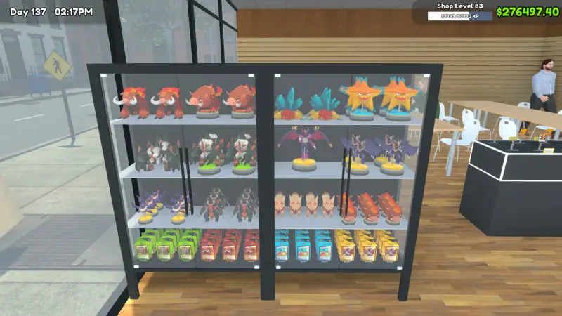 A display case filled with colorful TCG products in a shop setting, showcasing various collectible items in the video game TCG Card Shop Simulator.
