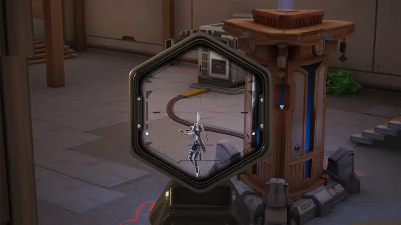 A gameplay scene from the video game Strinova shows a character aiming through a hexagonal scope, set in a futuristic environment with industrial elements.