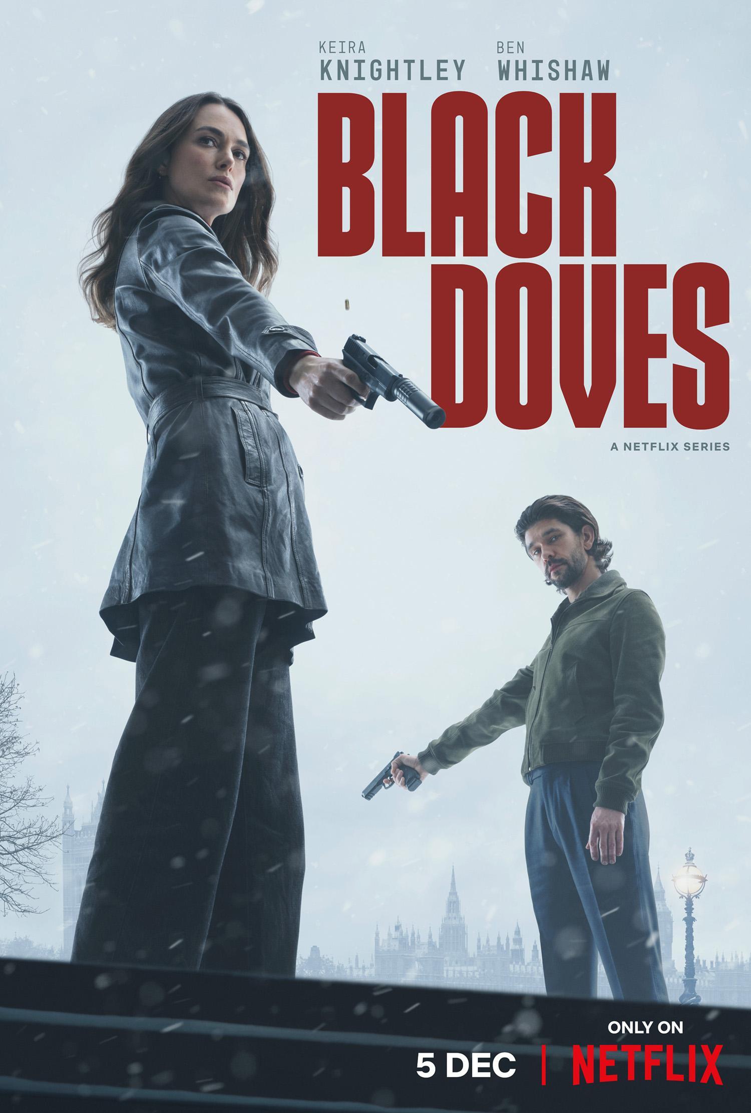 A gripping scene from the Netflix series Black Doves, featuring Kiera Knightley and Ben Whishaw, both armed and poised in a tense urban setting. Premieres on December 5.