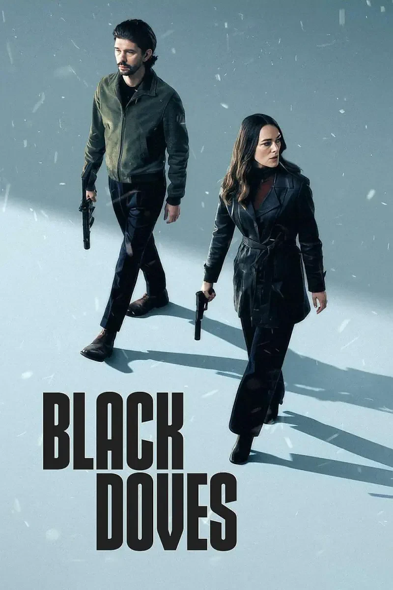 Two characters from the TV show *Black Doves* walk confidently through a snowy setting, each holding a gun, conveying a sense of tension and determination.