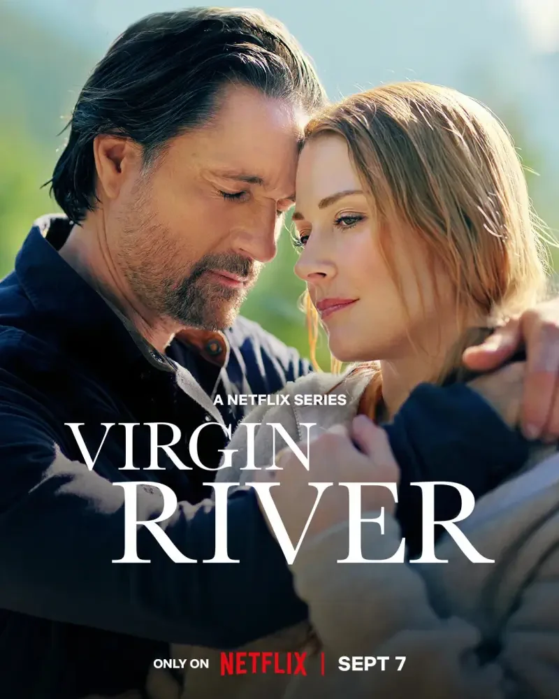 A heartfelt moment between two characters in the Netflix series Virgin River, showcasing their emotional connection against a serene backdrop.