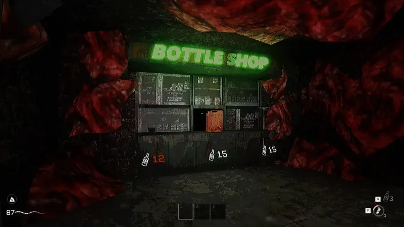 A dimly lit cave features a neon BOTTLE SHOP sign above a cluttered counter, surrounded by rocky red formations, creating an eerie atmosphere typical of the KLETKA video game.