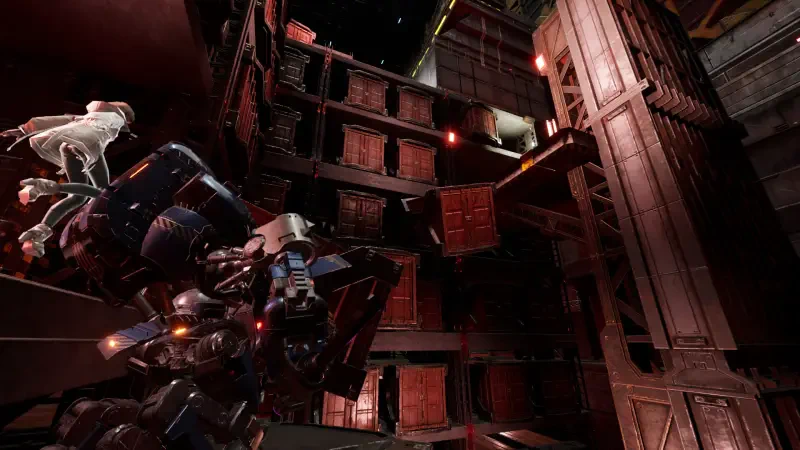 A scene from the video game SYNDUALITY: Echo of Ada, featuring a robotic character navigating a complex, industrial environment with stacked containers and dramatic lighting.