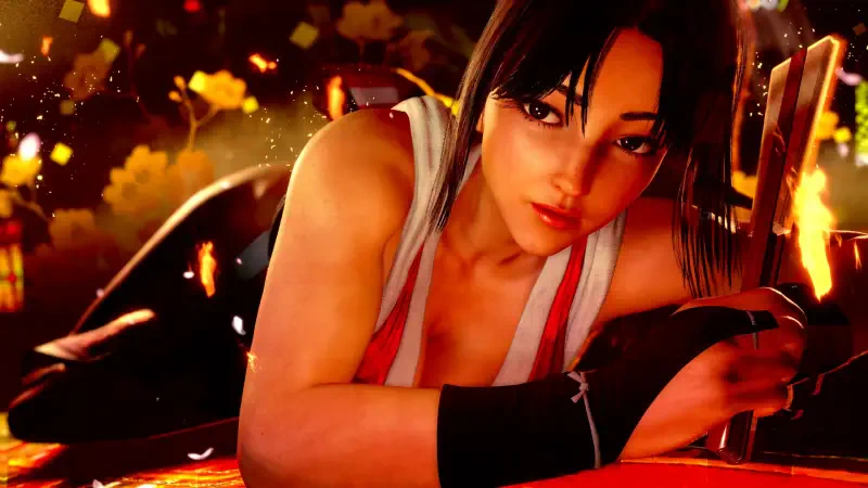 Mai from SNK is depicted in a dynamic, fiery scene from Street Fighter 6, showcasing her intense expression and detailed character design.