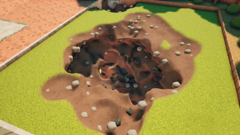Aerial view of a large, intricately dug hole surrounded by grass and rocks, showcasing gameplay from A Game About Digging A Hole.