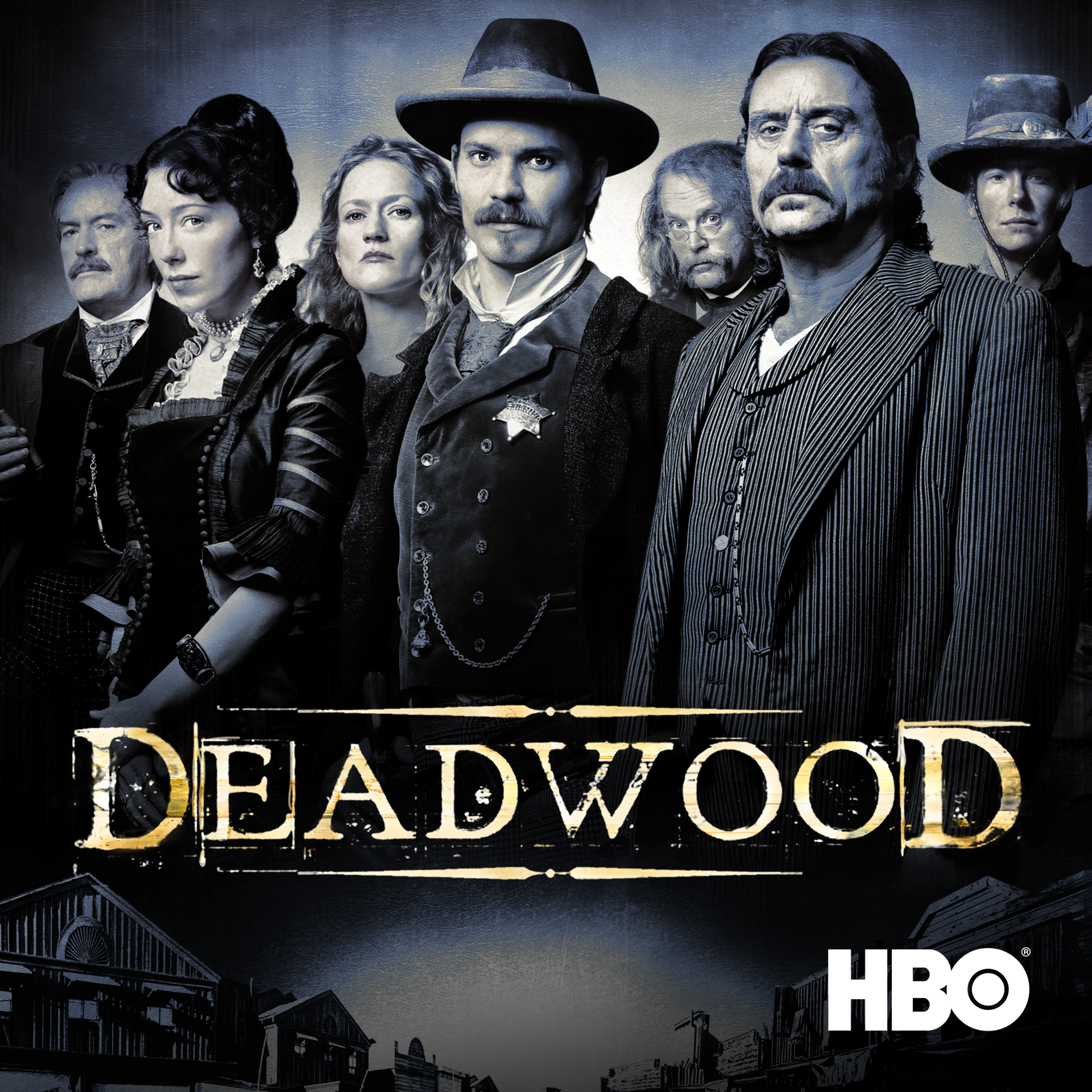 Poster for the TV show Deadwood: an ensemble of stern 19th-century Western characters in period dress beneath the Deadwood title and HBO logo.