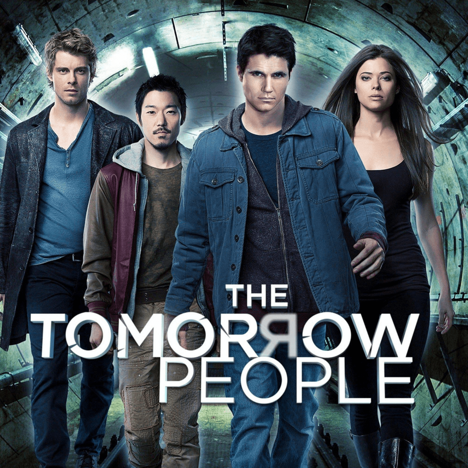 Promotional image for the TV show The Tomorrow People: four young adults in contemporary clothing walk toward the camera inside a glowing futuristic tunnel.