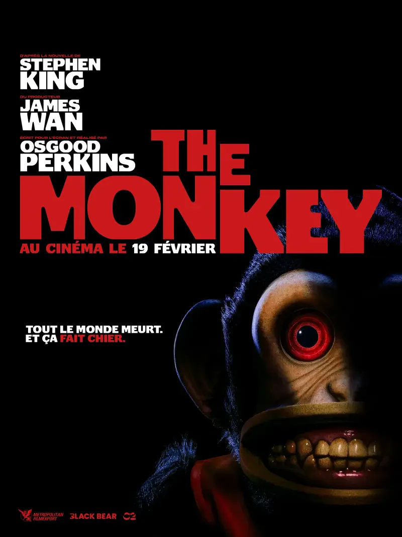 Movie poster for The Monkey (2025), featuring a sinister monkey with red eyes and sharp teeth. Includes names of Stephen King, James Wan, and Osgood Perkins. Release date: February 19.