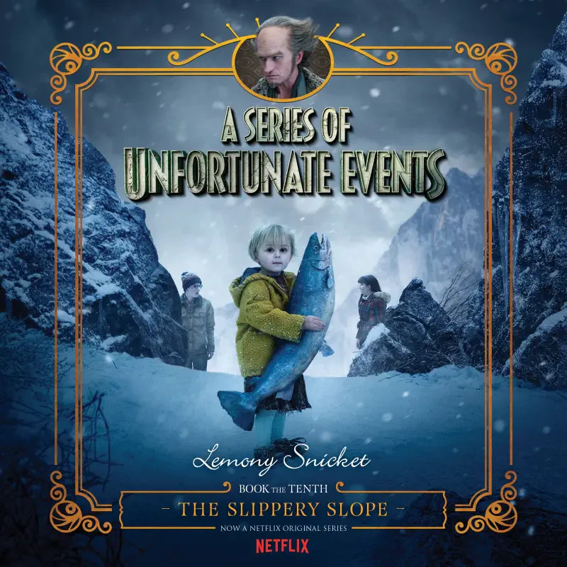 Poster for A Series of Unfortunate Events (TV show): a pale child in a yellow coat clutches a large fish on a snowy, rocky slope, set inside an ornate gold-framed design.