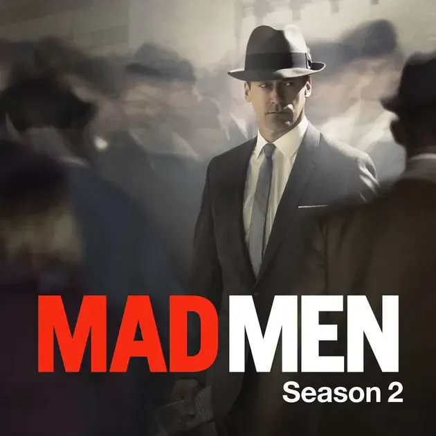 Mad Men Season 2 poster: suited man in a fedora stands among a blurred crowd, bold red and white MAD MEN logo.
