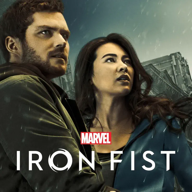 Promotional poster for Marvel's Iron Fist TV show (from Marvel Comics): two characters look skyward against a stormy city backdrop with the Marvel Iron Fist logo below.