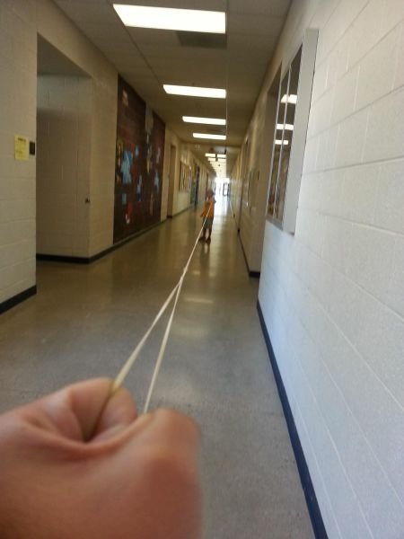 funny Trust hallway rubber band stretching Image